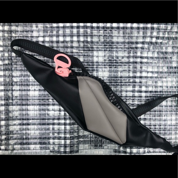 dotBliss Handbags - Cold Lips leather ((vegan)) fanny pack. Handmade in NC from reclaimed fabric.